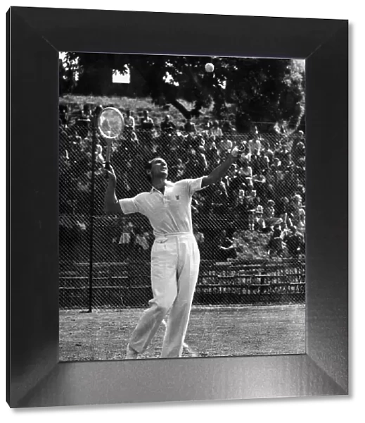 Fred Perry Tennis player demonstrates the service play during his exhibition at Cardiff