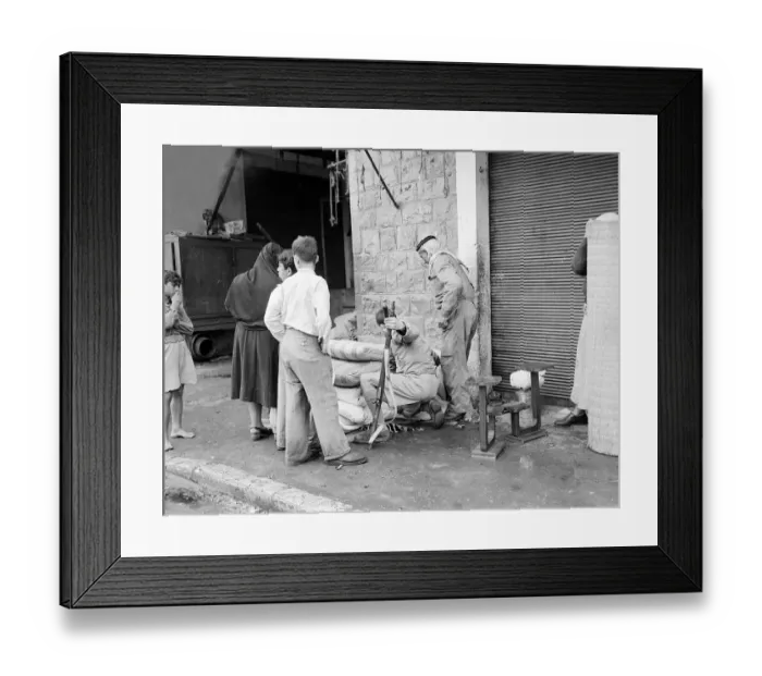 Framed Print : Isreali officer checks belongings of arab family Framed Print : Isreali officer checks belongings of arab family