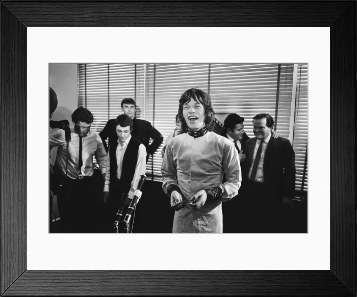 Framed Print : Rolling Stones singer Mick Jagger holding a press conference at Granada Studios in Soho