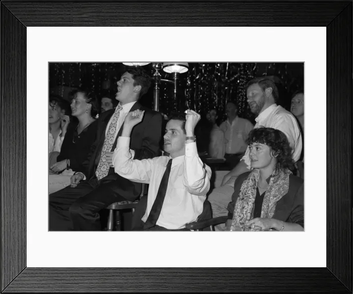 Framed Print : Football fans watching England in their semi-final match during the 1990 FIFA World Cup Framed Print : Football fans watching England in their semi-final match during the 1990 FIFA World Cup