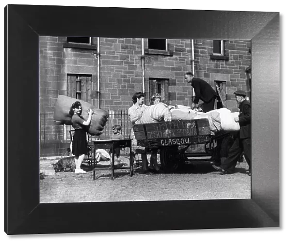 Squatters moving into derelict housing in Barlinnie, Glasgow, August 1946