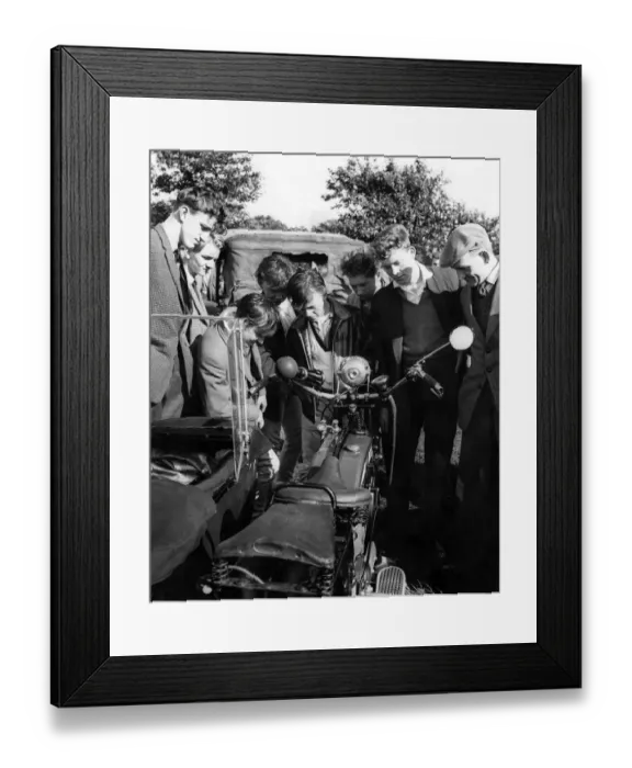 Framed Print : A group of boys and men looking at a motorcycle during the Tyneside Summer Exhibition Framed Print : A group of boys and men looking at a motorcycle during the Tyneside Summer Exhibition