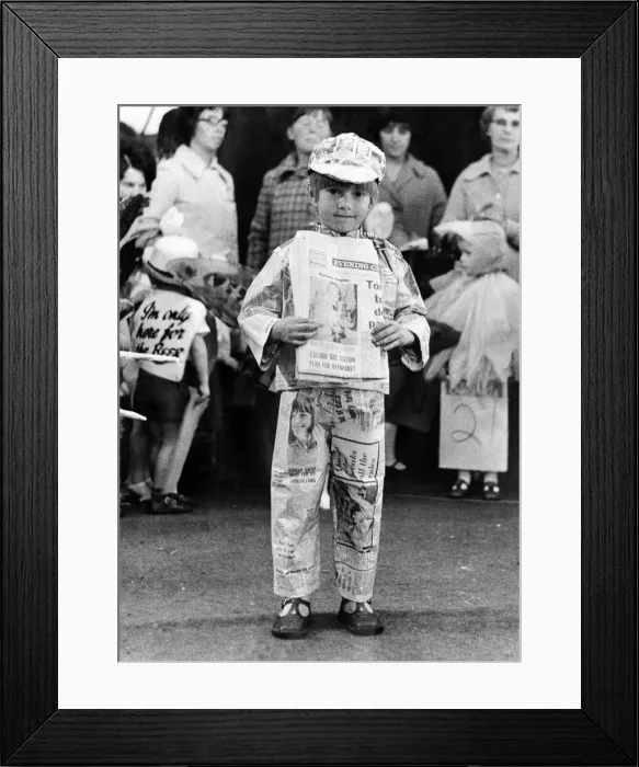 Framed Print : Five year old Sean, wearing a suit made of Evening Chronicle newspapers Framed Print : Five year old Sean, wearing a suit made of Evening Chronicle newspapers