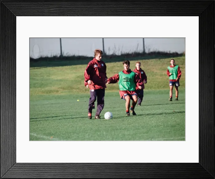 Framed Print : Manchester United in training. David Beckham on the ball challenged by Ben Framed Print : Manchester United in training. David Beckham on the ball challenged by Ben