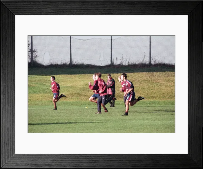Framed Print : Manchester United in training. David Beckham running with Gary and Phil Neville Framed Print : Manchester United in training. David Beckham running with Gary and Phil Neville