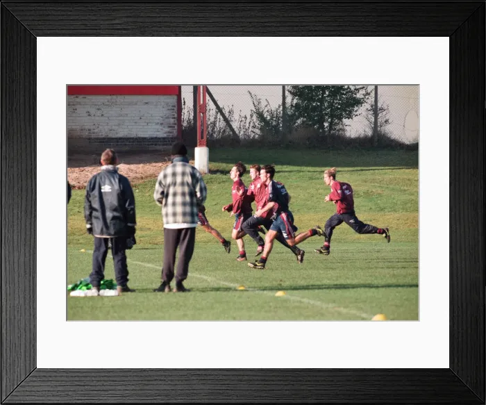 Framed Print : Manchester United in training. David Beckham running with Gary and Phil Neville Framed Print : Manchester United in training. David Beckham running with Gary and Phil Neville