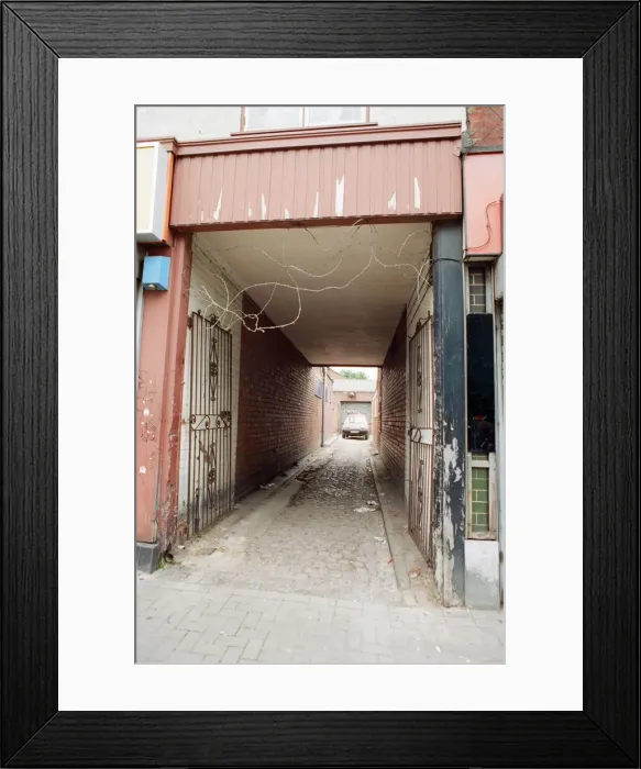 Framed Print : Barbed wire is allowed to be used as a form of security on Far Gosford Street Framed Print : Barbed wire is allowed to be used as a form of security on Far Gosford Street