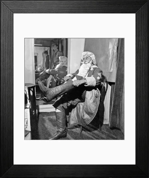Framed Print : Christmas: Father Christmas seen here at Pontings. Santa is played by 88 year old Stanley Framed Print : Christmas: Father Christmas seen here at Pontings. Santa is played by 88 year old Stanley