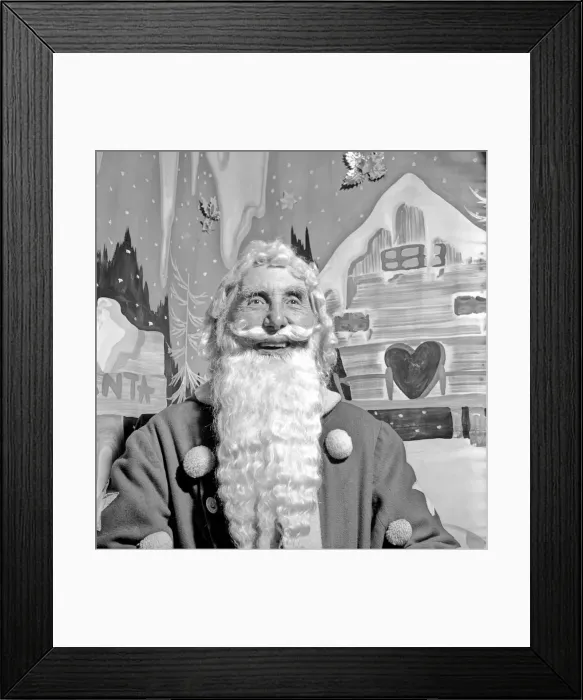 Framed Print : Christmas: Father Christmas seen here at Pontings. Santa is played by 88 year old Stanley Framed Print : Christmas: Father Christmas seen here at Pontings. Santa is played by 88 year old Stanley