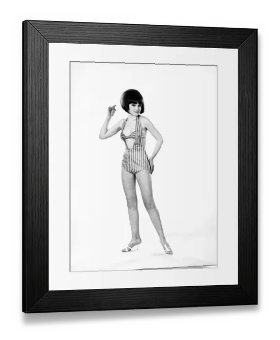 Framed Print : Model, Debbie Attwood, poses in the latest beachwear fashion, Studio Pix, 1963 Framed Print : Model, Debbie Attwood, poses in the latest beachwear fashion, Studio Pix, 1963