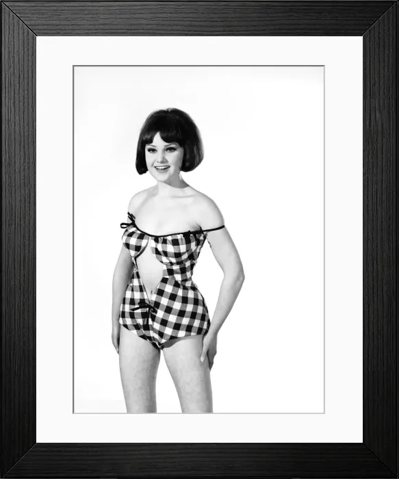 Framed Print : Model, Debbie Attwood, poses in the latest beachwear fashion, Studio Pix, 1963