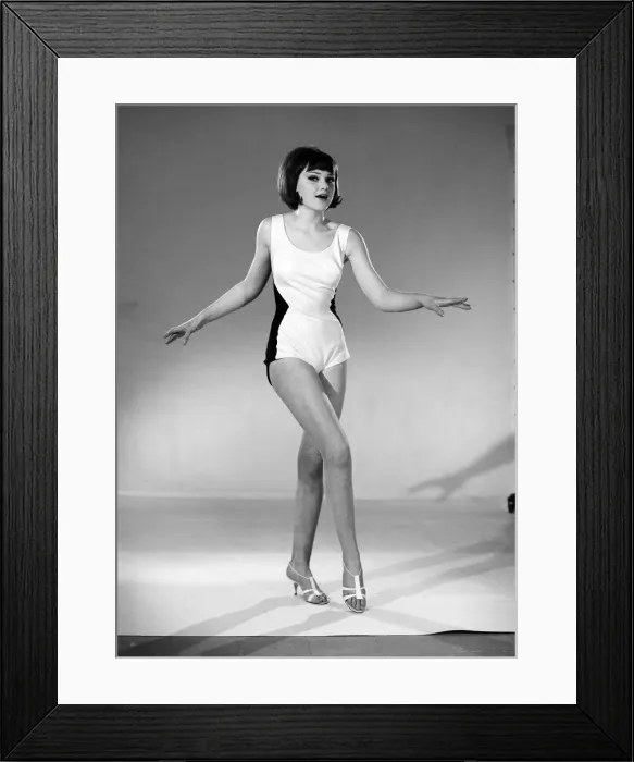 Framed Print : Model, Debbie Attwood, poses in the latest beachwear fashion, Studio Pix, 1963 Framed Print : Model, Debbie Attwood, poses in the latest beachwear fashion, Studio Pix, 1963