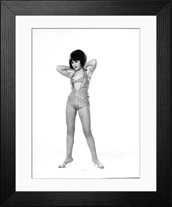 Framed Print : Model, Debbie Attwood, poses in the latest beachwear fashion, Studio Pix, 1963 Framed Print : Model, Debbie Attwood, poses in the latest beachwear fashion, Studio Pix, 1963