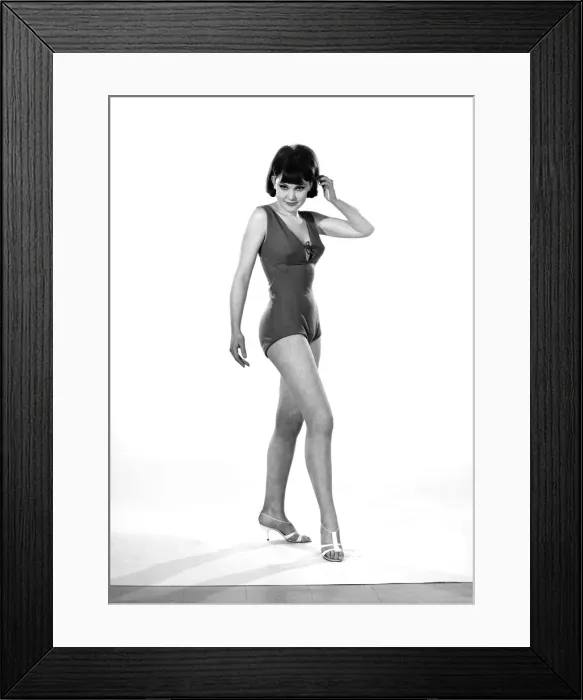 Framed Print : Model, Debbie Attwood, poses in the latest beachwear fashion, Studio Pix, 1963 Framed Print : Model, Debbie Attwood, poses in the latest beachwear fashion, Studio Pix, 1963