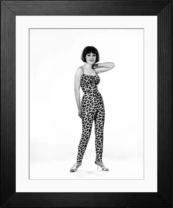 Framed Print : Model, Debbie Attwood, poses in the latest beachwear fashion, Studio Pix, 1963