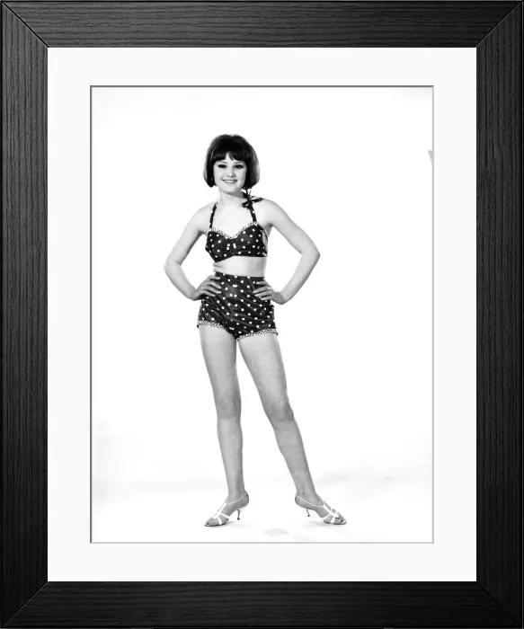 Framed Print : Model, Debbie Attwood, poses in the latest beachwear fashion, Studio Pix, 1963
