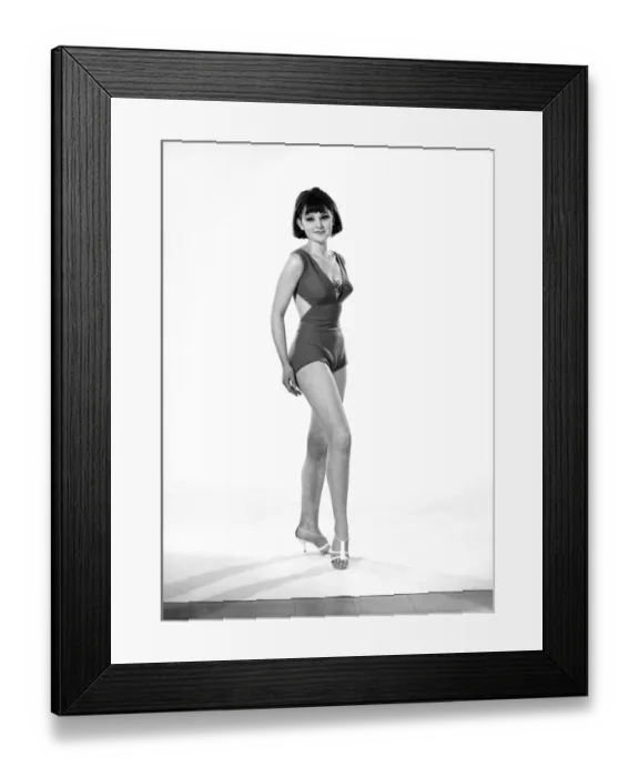 Framed Print : Model, Debbie Attwood, poses in the latest beachwear fashion, Studio Pix, 1963 Framed Print : Model, Debbie Attwood, poses in the latest beachwear fashion, Studio Pix, 1963