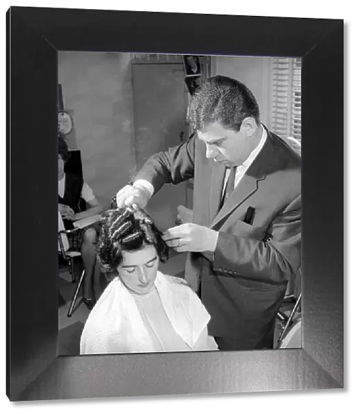 Woman have her hair cut and curled at the hair dressers, 7th June 1962
