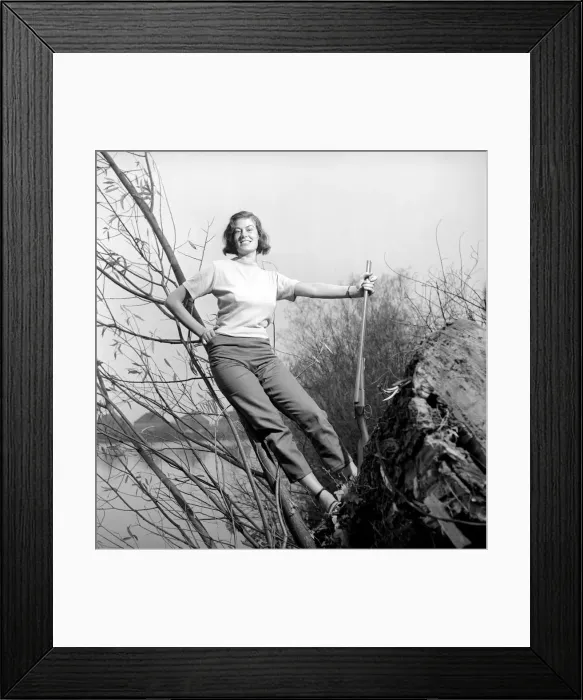Framed Print : Gwendolen Tulley poses with her rifle as she enjoys a shooting holiday, 1956 Framed Print : Gwendolen Tulley poses with her rifle as she enjoys a shooting holiday, 1956
