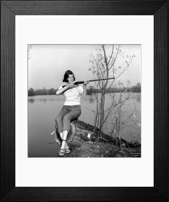 Framed Print : Gwendolen Tulley poses with her rifle as she enjoys a shooting holiday, 1956 Framed Print : Gwendolen Tulley poses with her rifle as she enjoys a shooting holiday, 1956