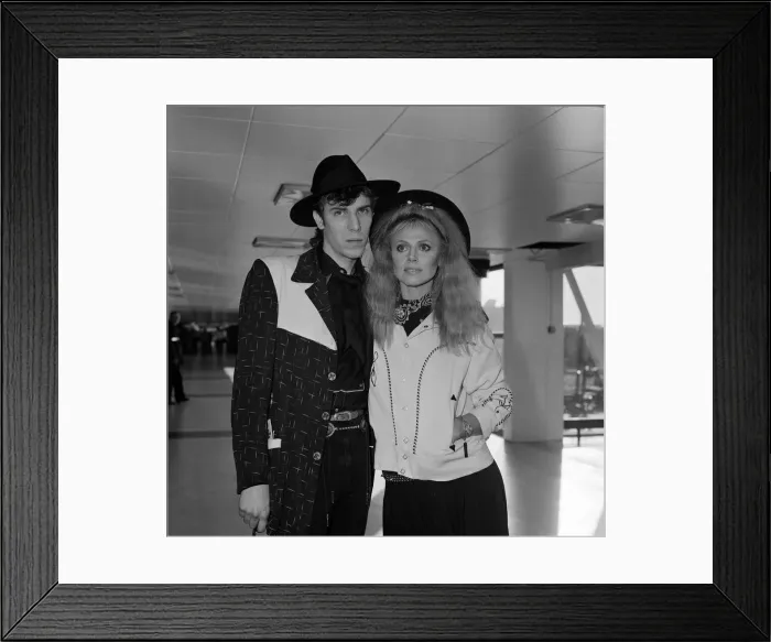Framed Print : Britt Ekland with boyfriend Slim Jim McDonnell at Heathrow Airport. 16th November 1982