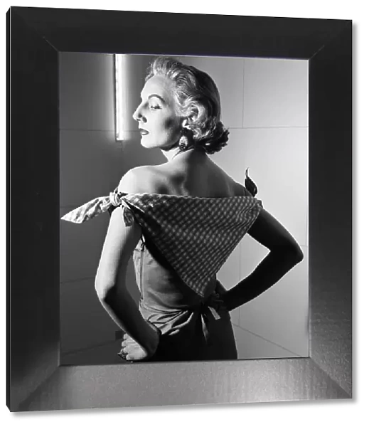 Model, wearing outfit designed by Italian fashion designer Madame Elsa Schiaparelli