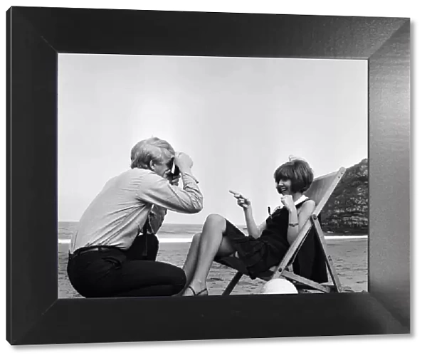 Cilla Black and her manager Bobby Willis on a beach on the Northumbrian coast