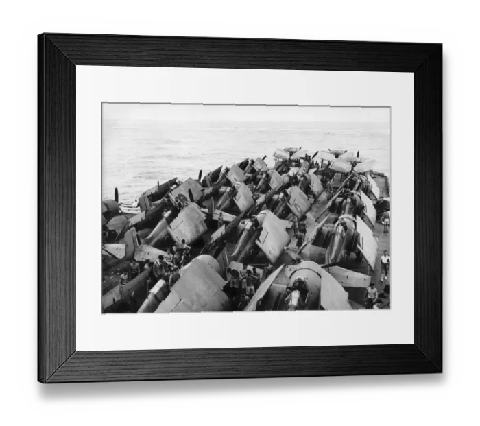 Framed Print : A big range of aircraft parked at the forward end of the flight deck of HMS Illustrious