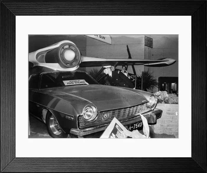 Framed Print : Motor Show Preview Day at Earls Court. Traffic Warden Jacqui Smith looks
