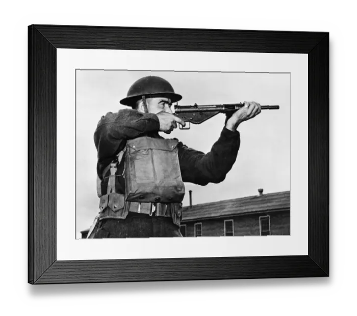 Framed Print : A Sten sub machine carbine, an all metal gun used in a similar way to the American Framed Print : A Sten sub machine carbine, an all metal gun used in a similar way to the American