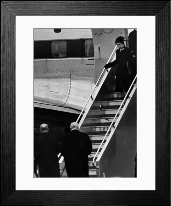 Framed Print : Princess Elizabeth steps from her plane after landing at London Airport after being Framed Print : Princess Elizabeth steps from her plane after landing at London Airport after being