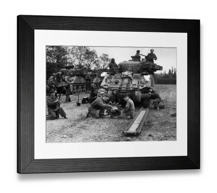 Framed Print : An armoured regiment overhauling one of their tanks Sherman for further battle against Framed Print : An armoured regiment overhauling one of their tanks Sherman for further battle against