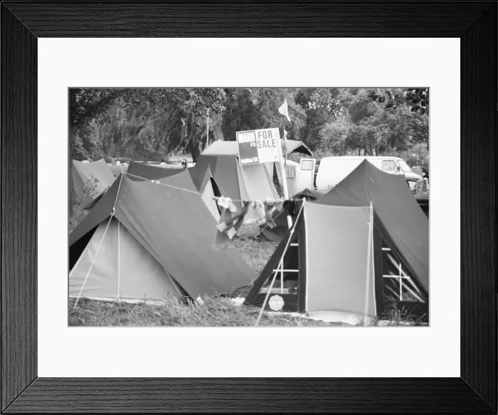 Framed Print : Campsite grows as festival goers start to arrive for the 20th National Rock Festival Framed Print : Campsite grows as festival goers start to arrive for the 20th National Rock Festival