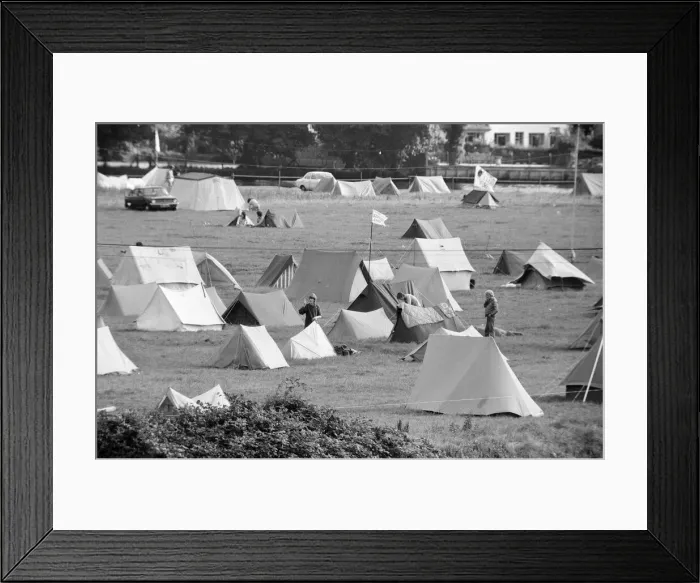 Framed Print : Campsite grows as festival goers start to arrive for the 20th National Rock Festival Framed Print : Campsite grows as festival goers start to arrive for the 20th National Rock Festival