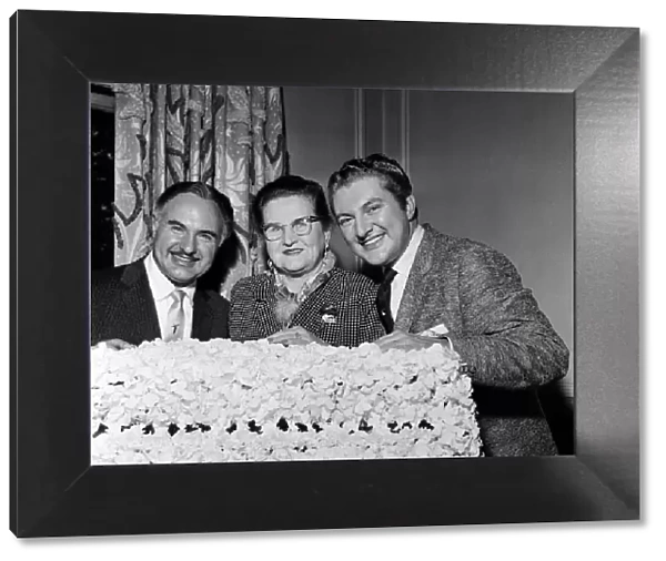 Liberace (right) with his brother George and his mother, during his visit to Southampton