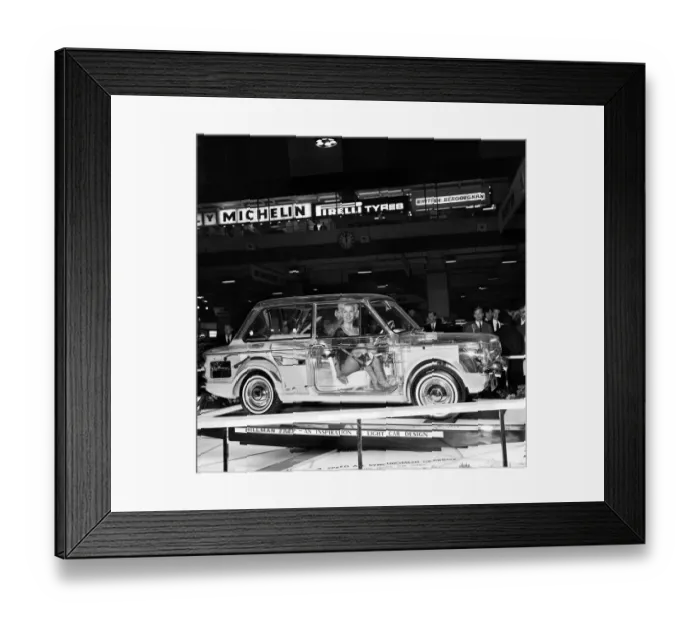 Framed Print : Model Caron gardner sits inside a Hillman Imp built of perspex to show the interior works Framed Print : Model Caron gardner sits inside a Hillman Imp built of perspex to show the interior works