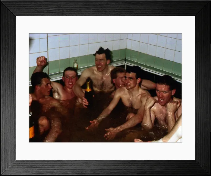 Framed Print : Celtic players celebrate in team-bath April 1988