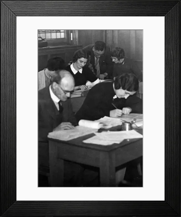Framed Print : Teachers in Jarrow join the war effort by helping the preparation of ration cards Framed Print : Teachers in Jarrow join the war effort by helping the preparation of ration cards