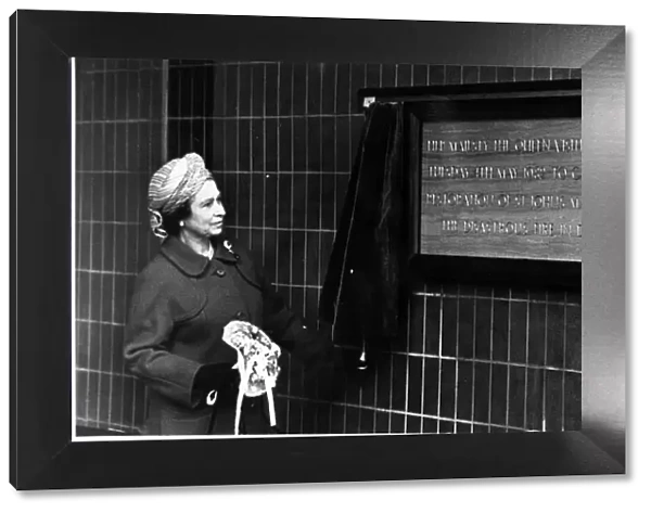 Queen Elizabeth II, in Liverpool, unveiling a plaque to commemorate the restoration of