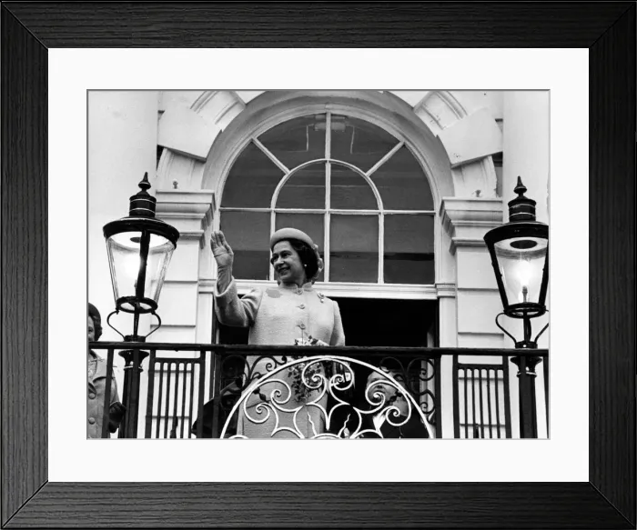 Framed Print : Queen Elizabeth II waves to the crowd from the balcony at Warrington Town Hall Framed Print : Queen Elizabeth II waves to the crowd from the balcony at Warrington Town Hall