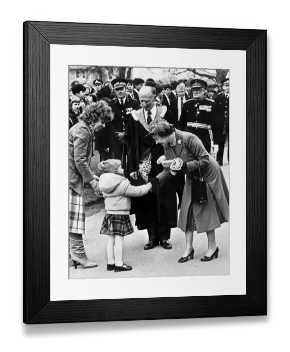 Framed Print : Queen Elizabeth II visits North Wales. Three year old Natalie Davies says Framed Print : Queen Elizabeth II visits North Wales. Three year old Natalie Davies says
