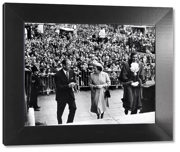 Queen Elizabeth II and The Duke of Edinburgh with the huge crowd behind them in