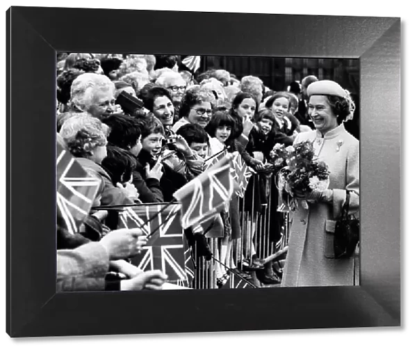 Queen Elizabeth II is all smiles as she meets the people of Warrington, Cheshire