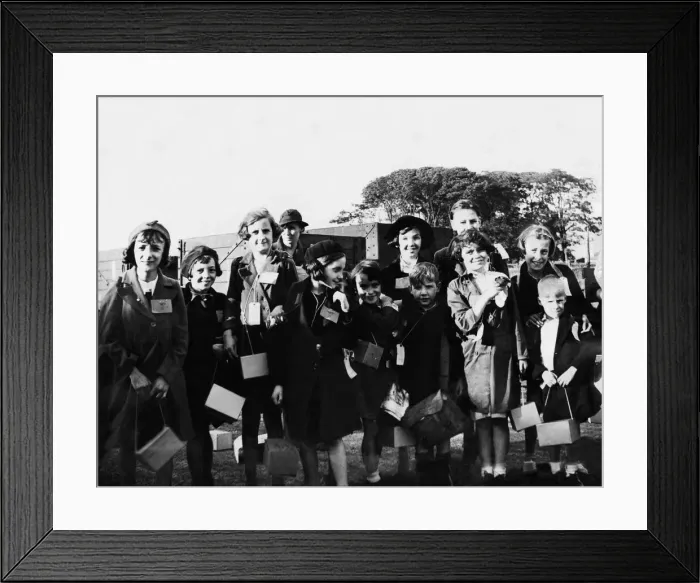 Framed Print : In the safety zone now - Evacuation seemed to be something in the nature of an adventure Framed Print : In the safety zone now - Evacuation seemed to be something in the nature of an adventure