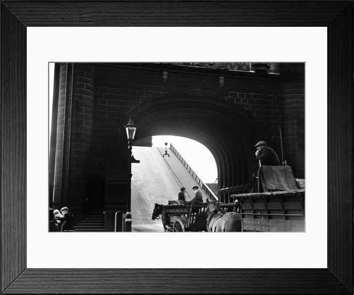 Framed Print : Horse drawn carts wait whilst Tower Bridge is raised Circa August 1936 Framed Print : Horse drawn carts wait whilst Tower Bridge is raised Circa August 1936