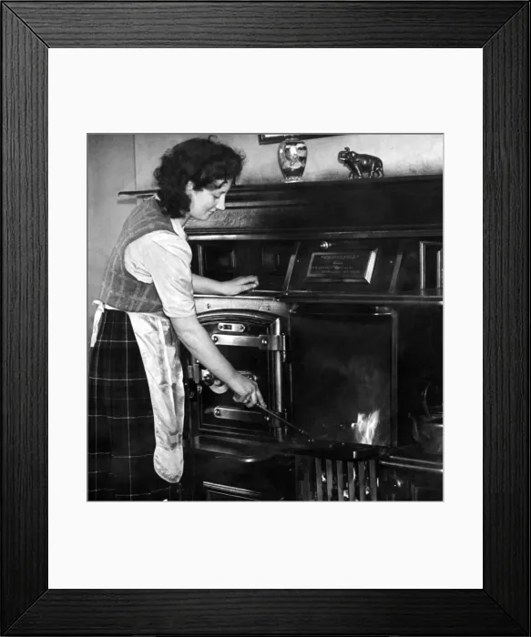 Framed Print : Miss Gwen Johnstone, daughter of Mr and Mrs Johnstone in the living room of the farm Framed Print : Miss Gwen Johnstone, daughter of Mr and Mrs Johnstone in the living room of the farm