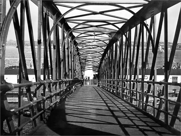 Sunshine on the bridge to Rock Ferry Pier. 6th October 1937