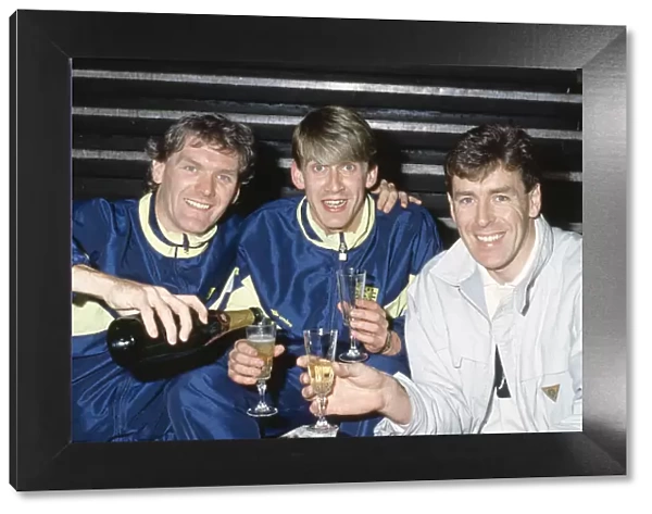 Scotland footballer Gary Mackay (centre) is toasted by Roy Aitken