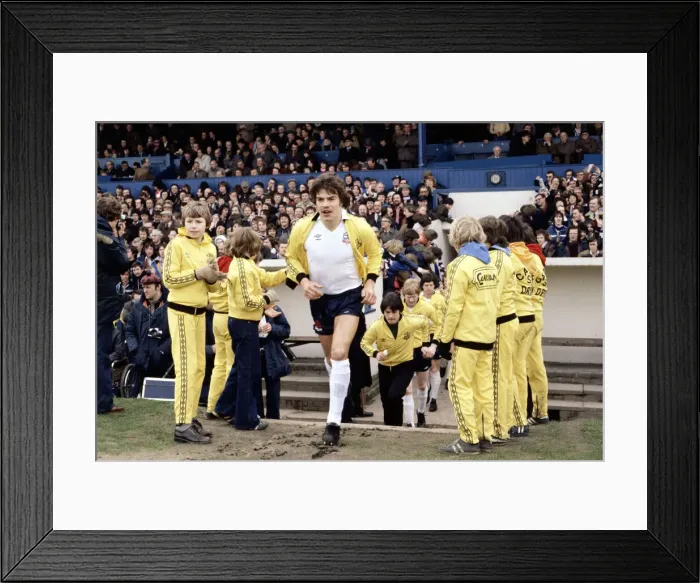 Framed Print : Bolton Wanderers captain Sam Allardyce leads his team out on to the pitch ahead of a