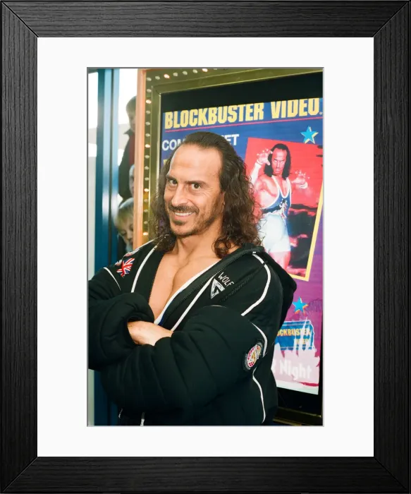 Framed Print : Wolf from Gladiators opening the new Blockbuster Video in Reading. 6th November 1994 Framed Print : Wolf from Gladiators opening the new Blockbuster Video in Reading. 6th November 1994